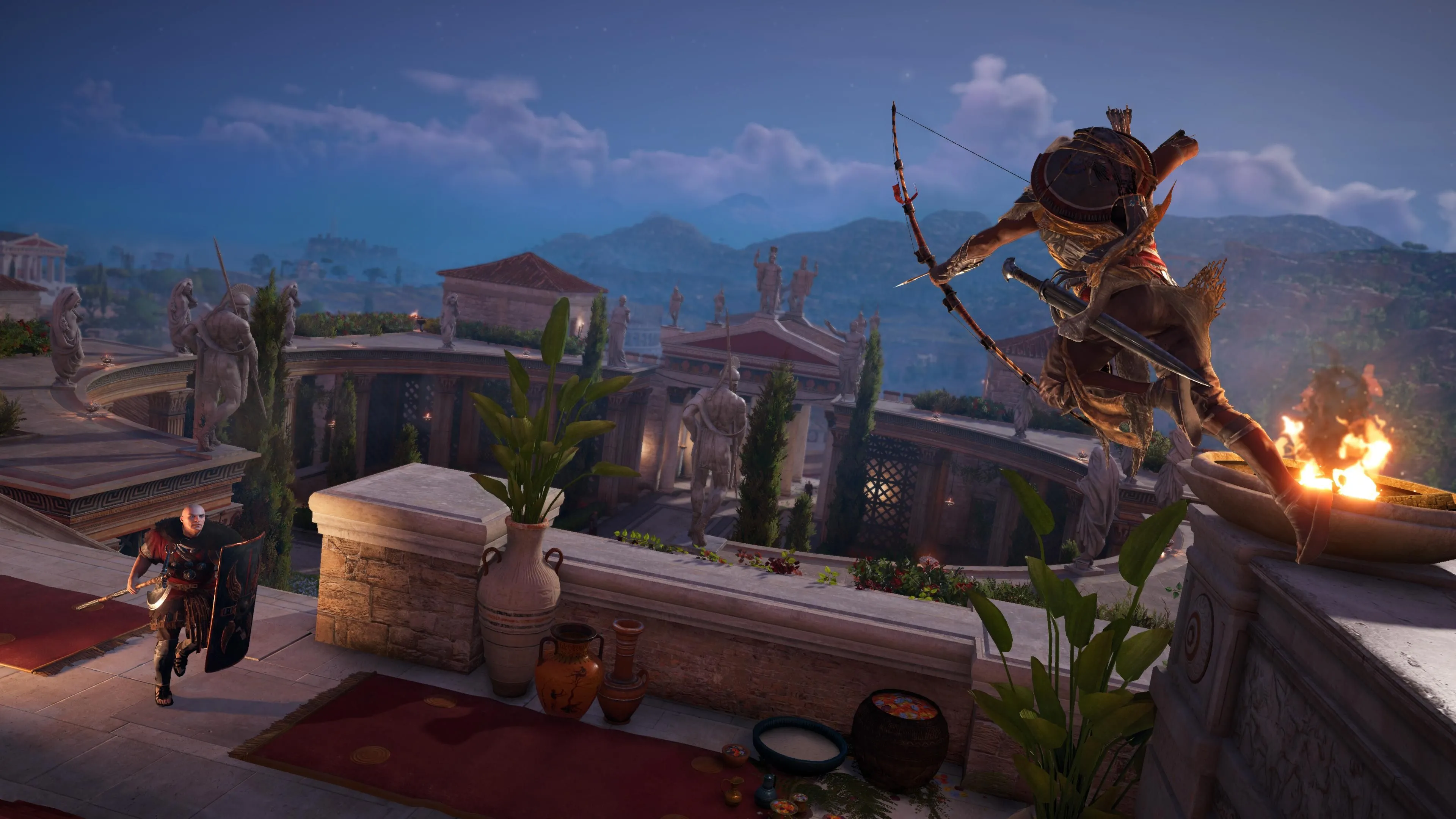 Bayek nhảy từ một gờ đá và ngắm cung vào một người lính cầm khiên