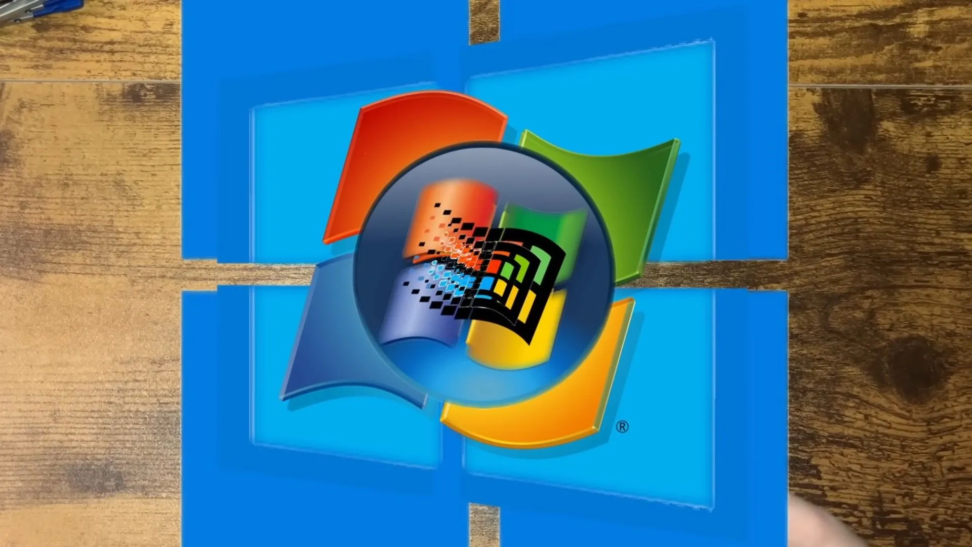 Biểu tượng các phiên bản Windows từ cũ đến mới minh họa khái niệm máy ảo lồng nhau