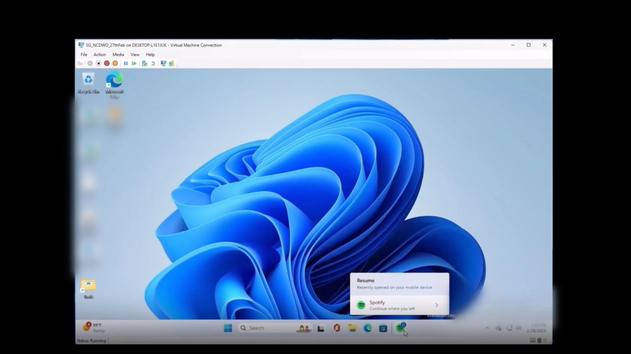 Biểu tượng Spotify trên thanh tác vụ Windows 11 báo hiệu tính năng Cross Device Resume hoạt động
