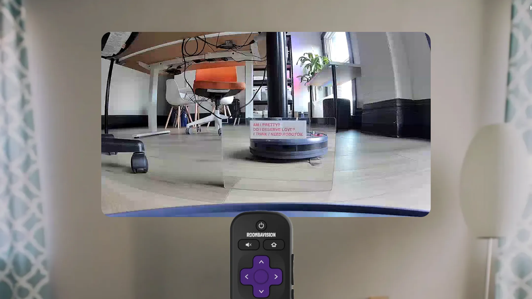 Giao diện điều khiển Roombavision với hình ảnh trực tiếp từ camera Roomba chiếu cảnh vật qua gương, minh họa khả năng điều khiển robot từ xa bằng Raspberry Pi.