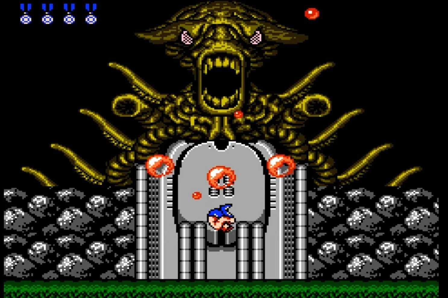 Hai chiến binh Contra đối đầu với trùm cuối ngoài hành tinh đầy thách thức trong game Contra trên hệ máy NES