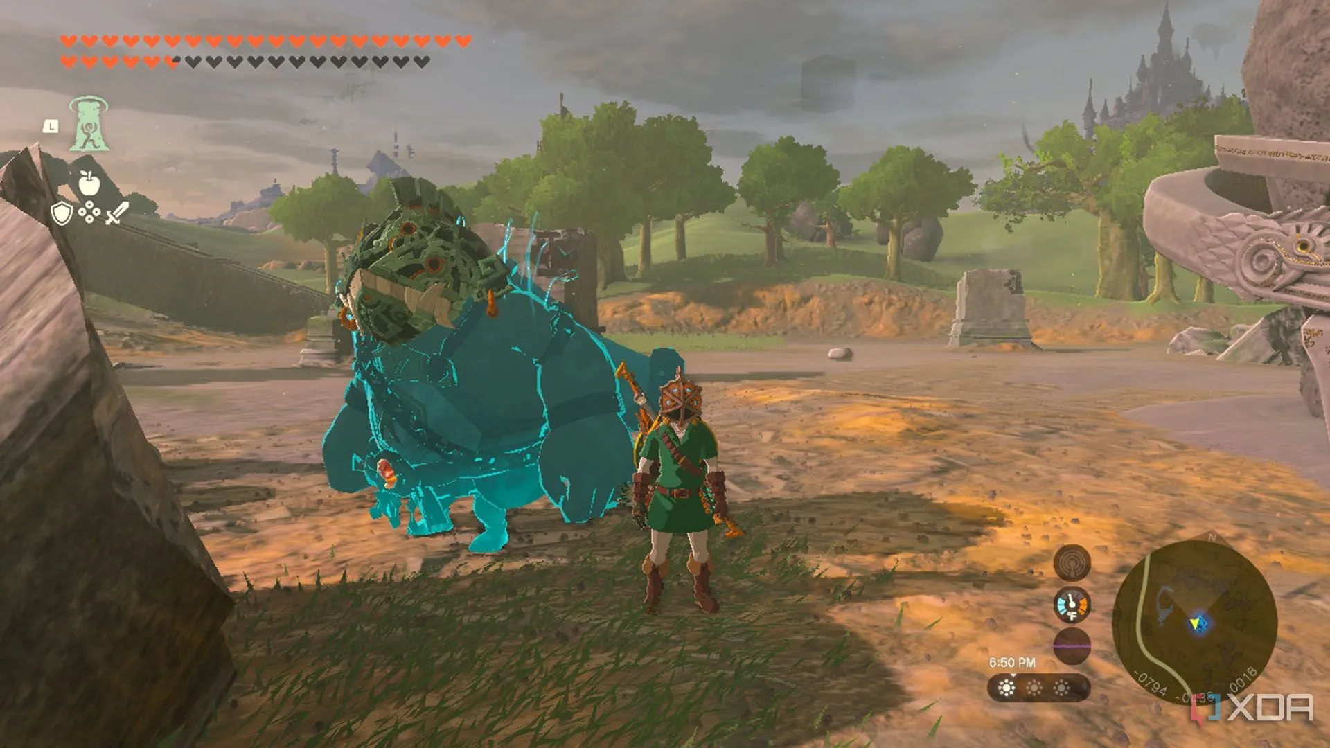 Link và linh hồn Yunobo đang đeo mặt nạ Divine Beast tương ứng trong The Legend of Zelda: Tears of the Kingdom.