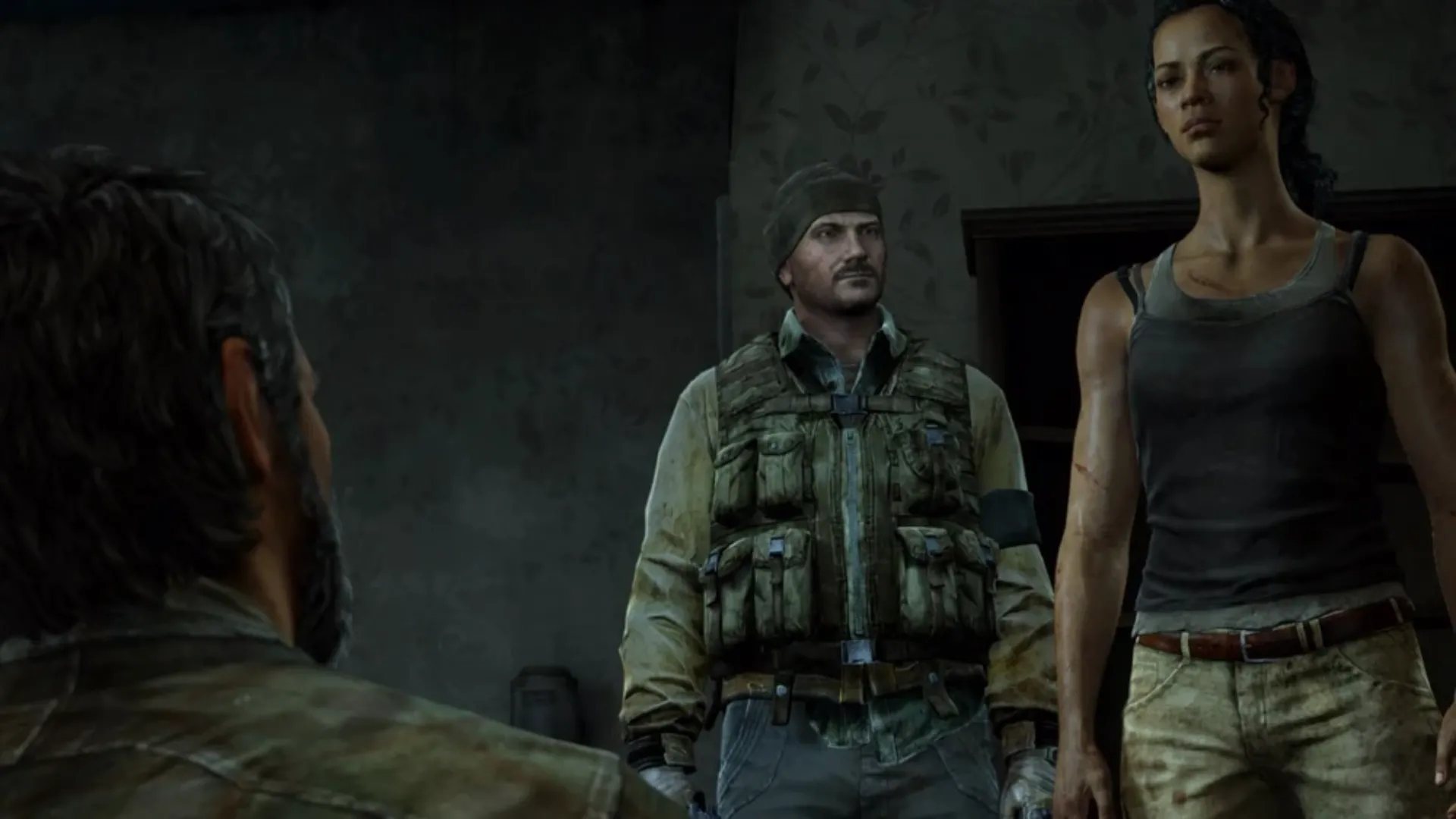 Lực lượng Fireflies đang chất vấn Joel trong The Last of Us, tổ chức với mục tiêu cao cả nhưng phương pháp gây tranh cãi.