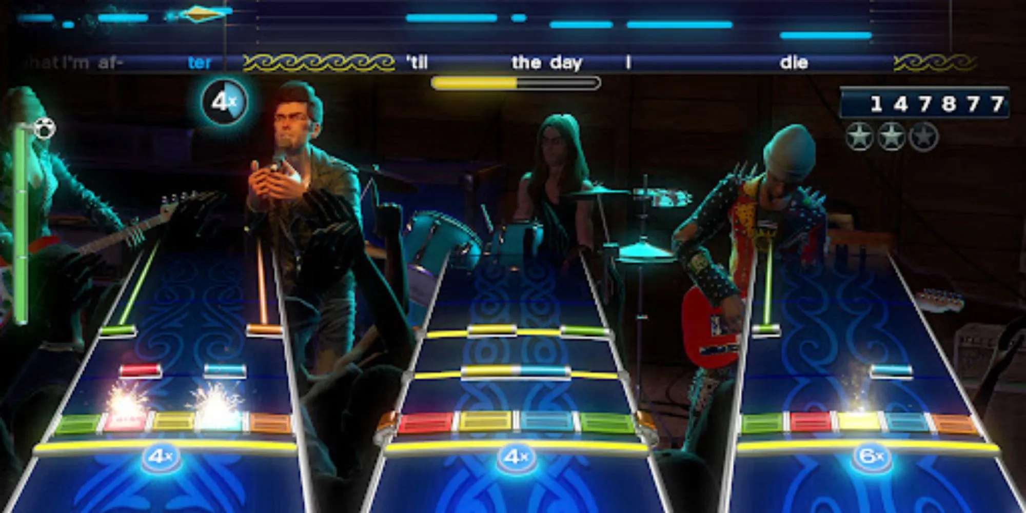 Một hình ảnh chụp màn hình ban nhạc đầy đủ trong khi chơi game Rock Band 4