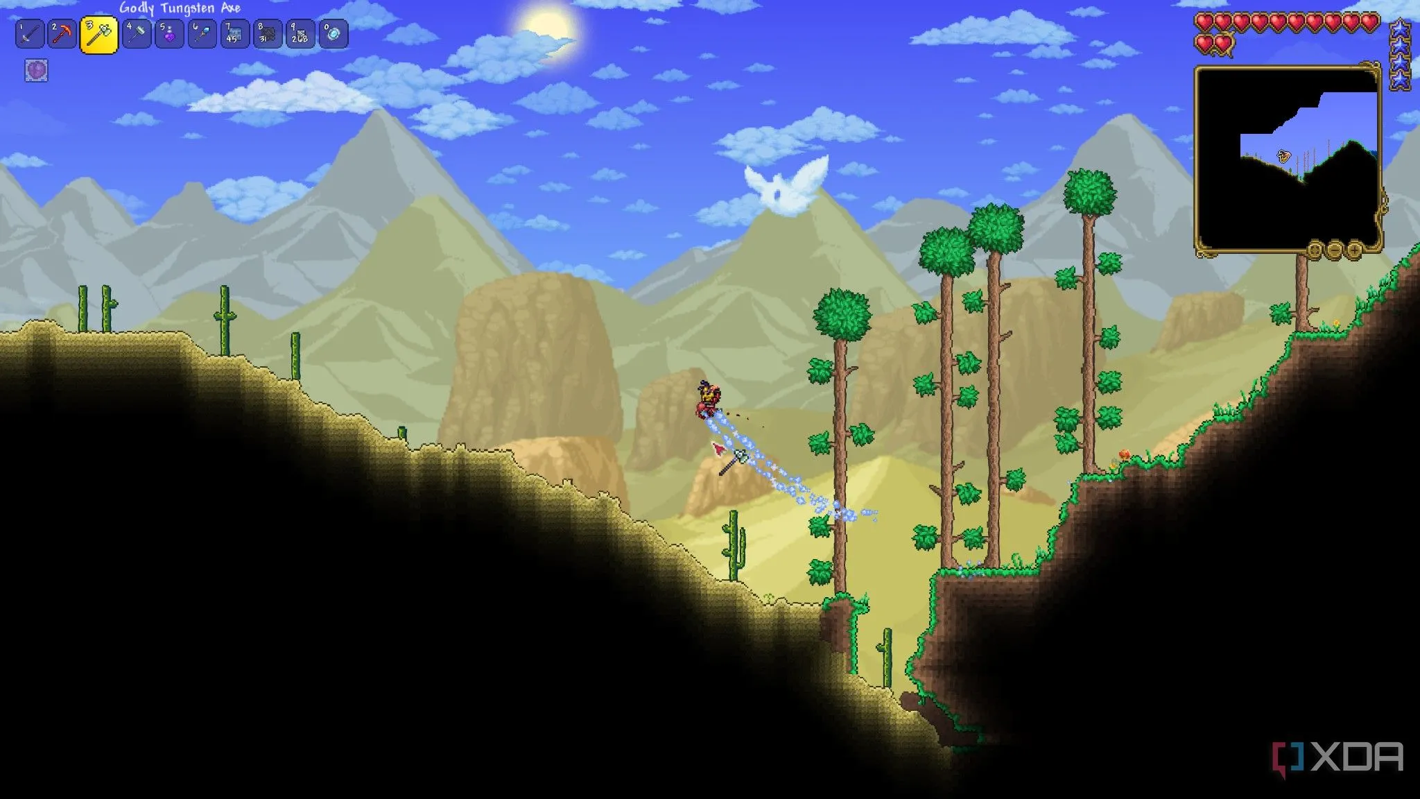 Người chơi khám phá quần xã sinh vật sa mạc đầy cát trong game sinh tồn Terraria, với đồ họa pixel vượt thời gian.