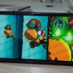 Nintendo Switch OLED đang chạy game Mario Strikers Battle League, minh họa tính di động và game độc quyền.