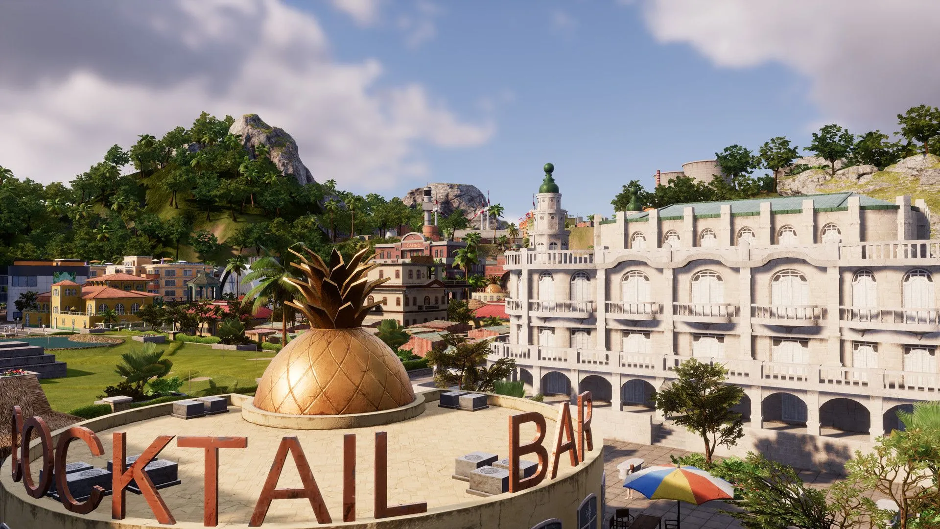 Quảng trường trung tâm với tượng đài và người dân hoạt động trong Tropico 6.