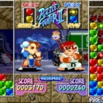 Screenshot hai nhân vật Chun-Li và Ryu trong game Super Puzzle Fighter II Turbo đang đối đầu trên màn hình giải đố