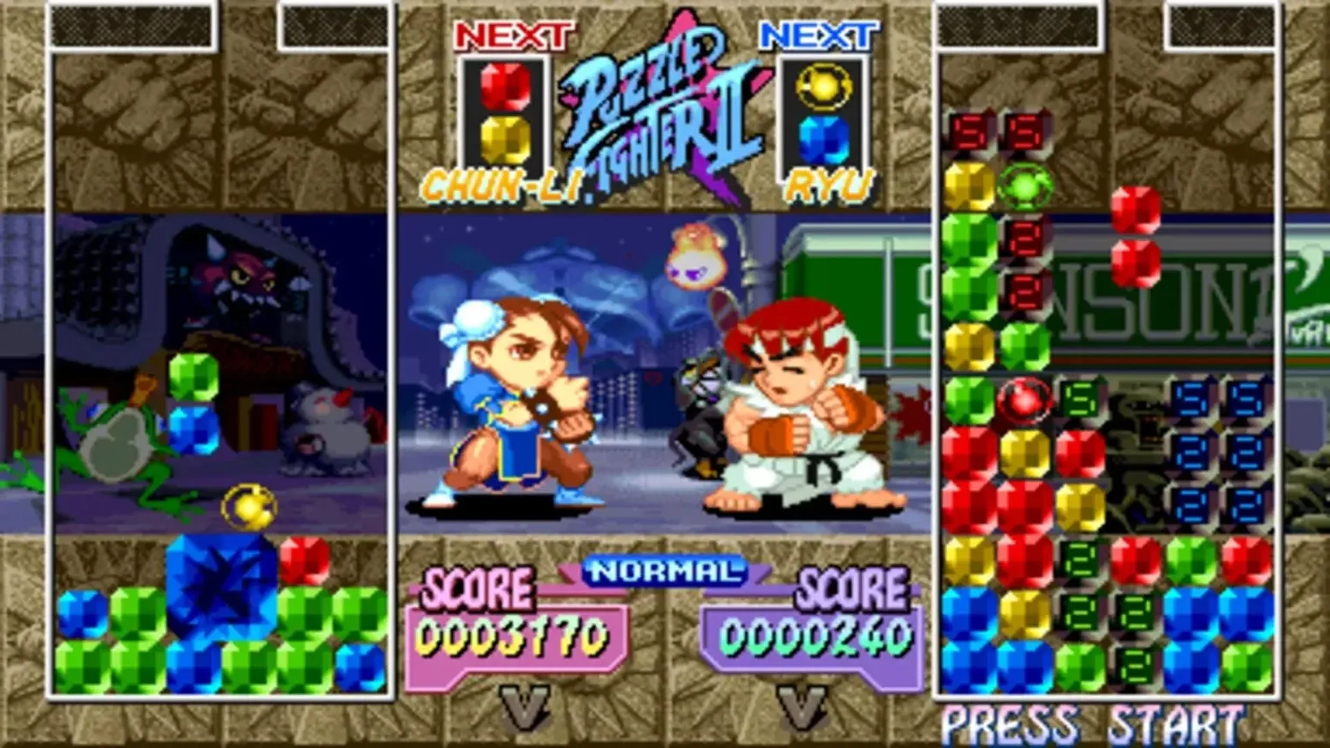 Screenshot hai nhân vật Chun-Li và Ryu trong game Super Puzzle Fighter II Turbo đang đối đầu trên màn hình giải đố