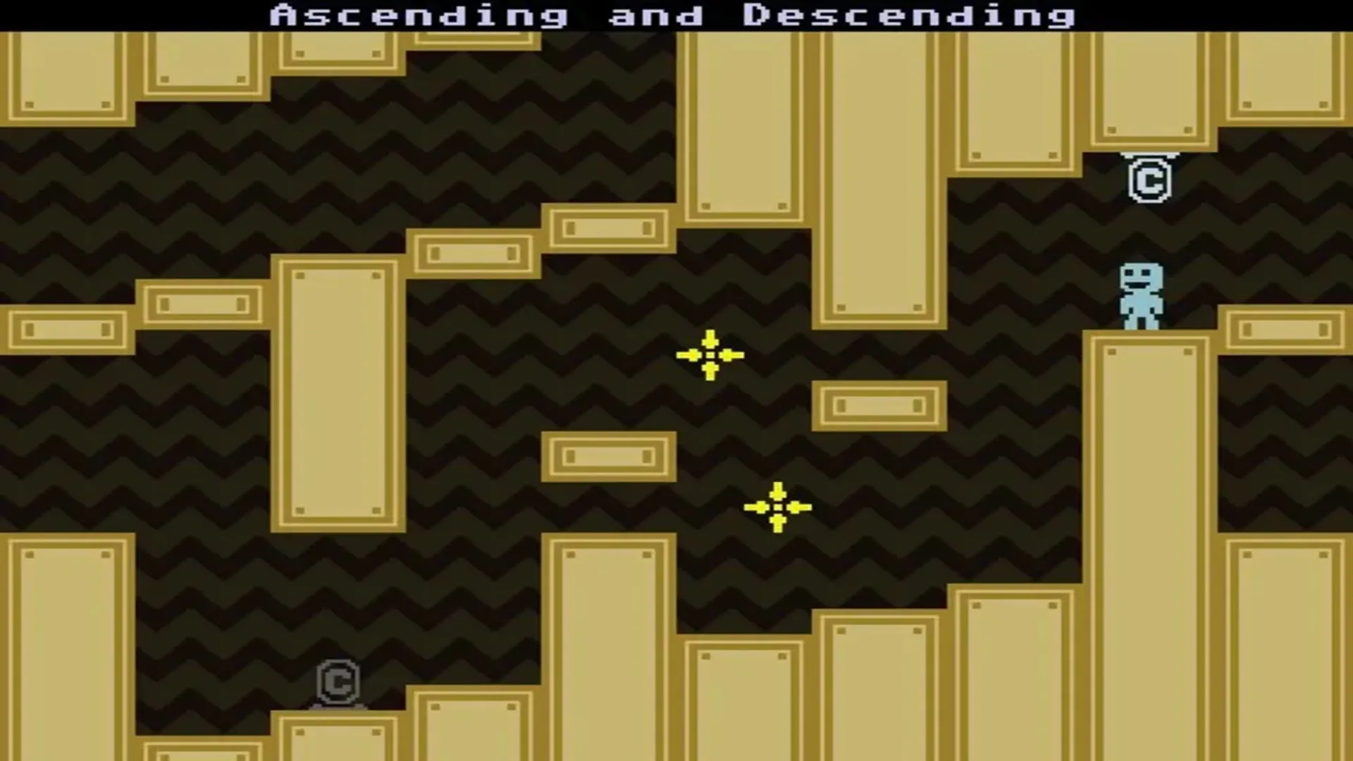 VVVVVV - Ảnh chụp màn hình gameplay Captain Viridian điều khiển trọng lực để vượt chướng ngại vật trong một căn phòng đầy màu sắc của game VVVVVV trên PlayStation Vita